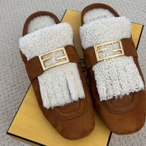 NWT- Fendi shearling Suede mules 
Calf leather
